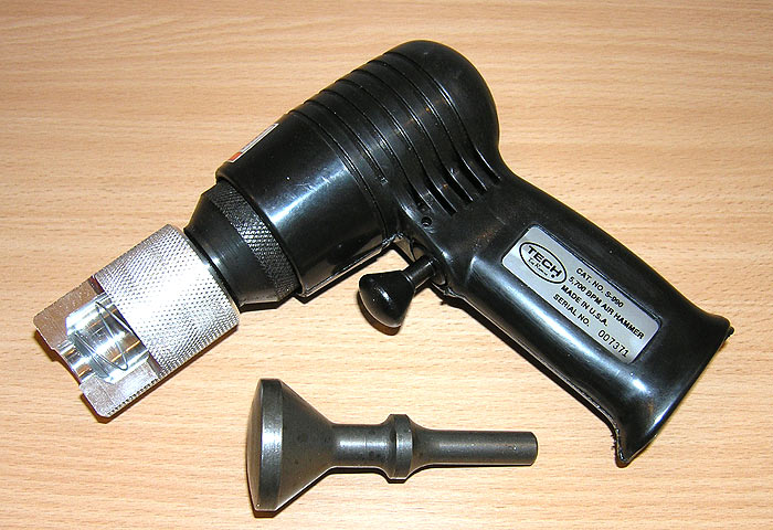 Пневмомолоток с ударной головкой